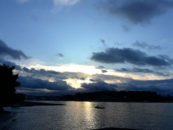 Scenic view of sea against sky at sunset