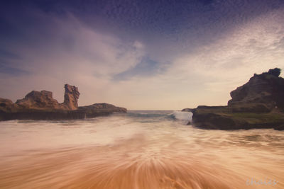 Scenic view of sea against sky during sunset