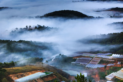 Scenic view of mountains during foggy weather