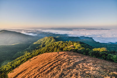 Scenic view of landscape against sky during sunset