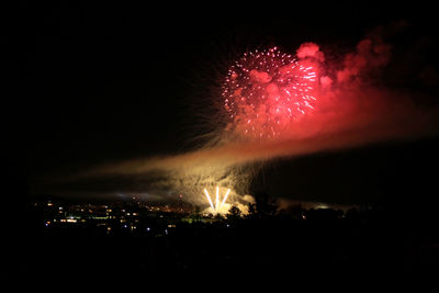 Firework display at night