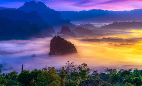 Scenic view of mountains against sky during sunset