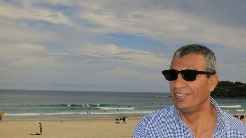 lifestyles, leisure activity, sunglasses, headshot, sea, beach, person, young adult, sky, water, young men, vacations, head and shoulders, portrait, looking at camera, shore, outdoors