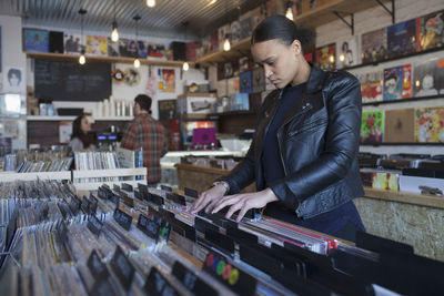 Young woman in a record store.