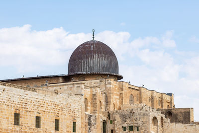 Low angle view of historical building against sky