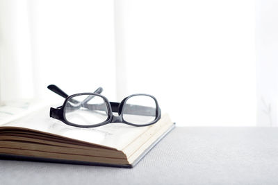 Close-up of eyeglasses on table