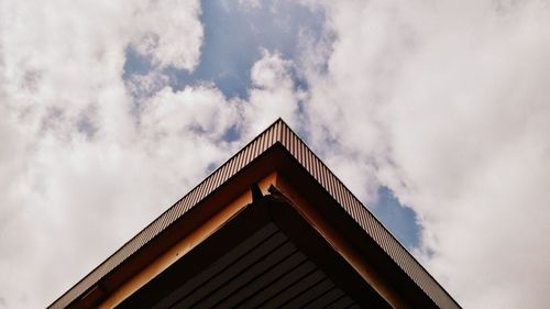 High section of building against cloudy sky