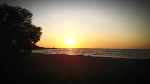 View of calm sea at sunset