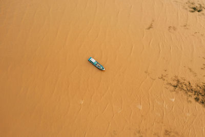 High angle view of umbrella on sand