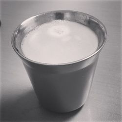 High angle view of coffee cup on table