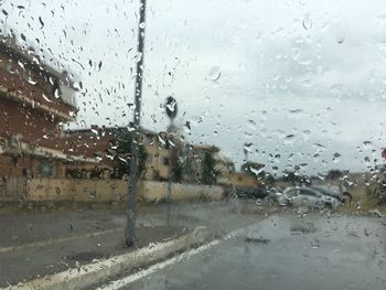 Wet glass window in rainy season