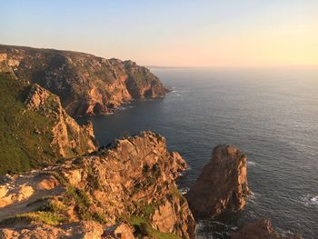 Scenic view of sea against sky during sunset