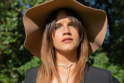 Close-up of woman wearing hat