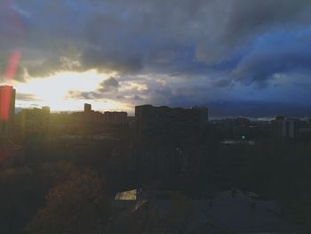 High angle view of buildings against sky at sunset