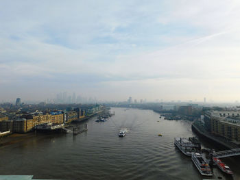 High angle view of boats in city