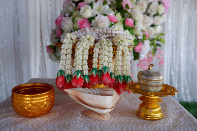 Close-up of flower vase on table