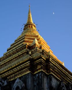 Low angle view of temple building against clear sky