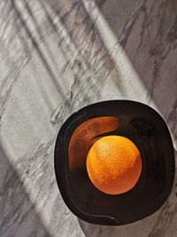 High angle view of orange on table