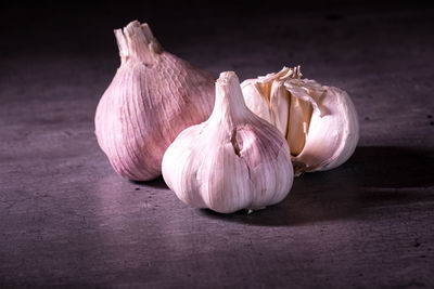 Close-up of garlic on table