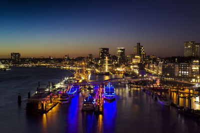 View of illuminated city at waterfront