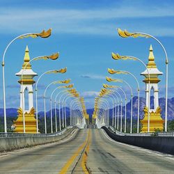 View of road against cloudy sky