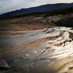 Scenic view of desert against sky