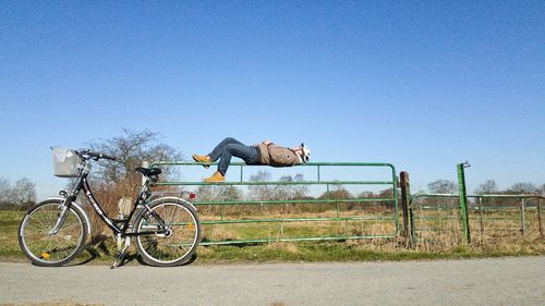 Bicycle against clear blue sky