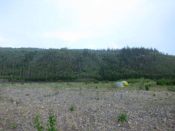 Scenic view of land against sky