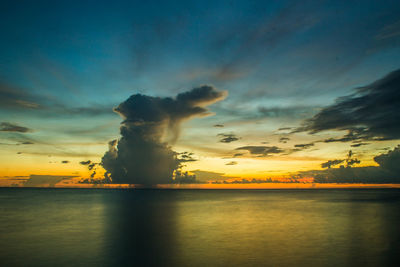 Scenic view of lake against sky during sunset