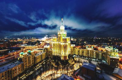 High angle view of illuminated buildings in city at night