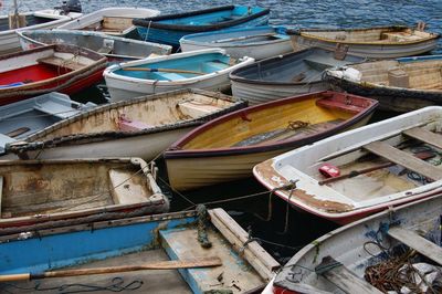 High angle view of boats moored at harbor