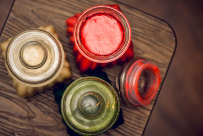 High angle view of bottles on table