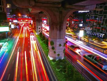 High angle view of light trails on road at night