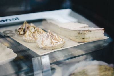 Close-up of tart and sandwich for sale