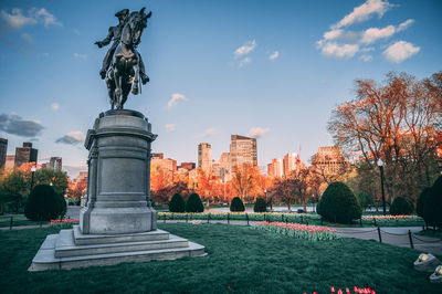 Statue of george washington against sky in boston public garden