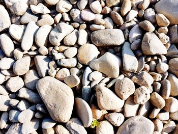 Full frame shot of pebbles on beach