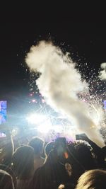 View of firework display at night