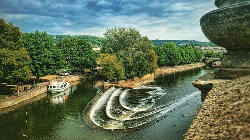 View of river against cloudy sky