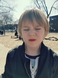 Close-up of boy with eyes closed