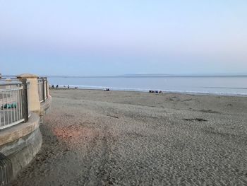 Scenic view of beach against clear sky