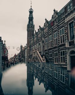 Reflection of buildings in city