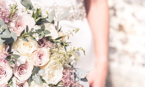 Close-up of woman holding bouquet