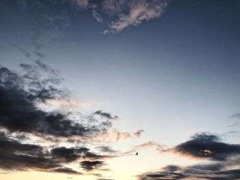 Low angle view of cloudy sky during sunset