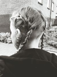 Rear view of girl with braided hair