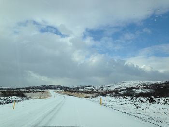 Road passing through field