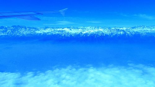 Close-up of sea against blue sky