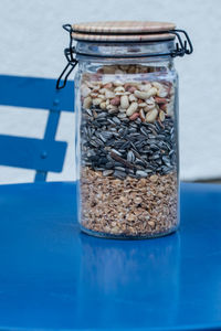 Close-up of bread in glass jar on table