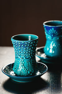 Close-up of coffee cup on table