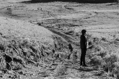 Woman standing on field