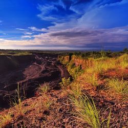 Scenic view of landscape against romantic sky